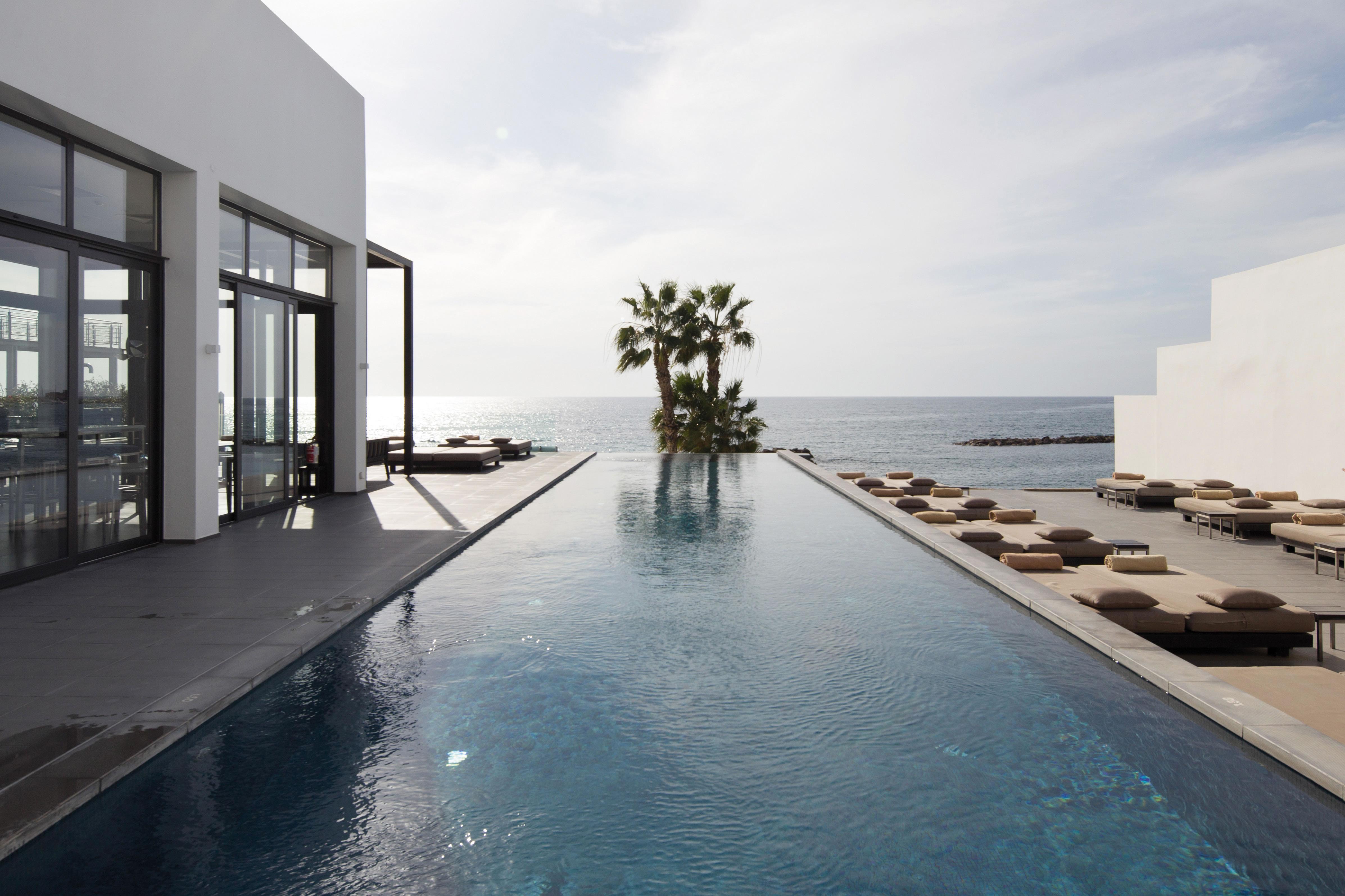 Almyra Hotel Пафос Екстериор снимка The pool at the Hotel