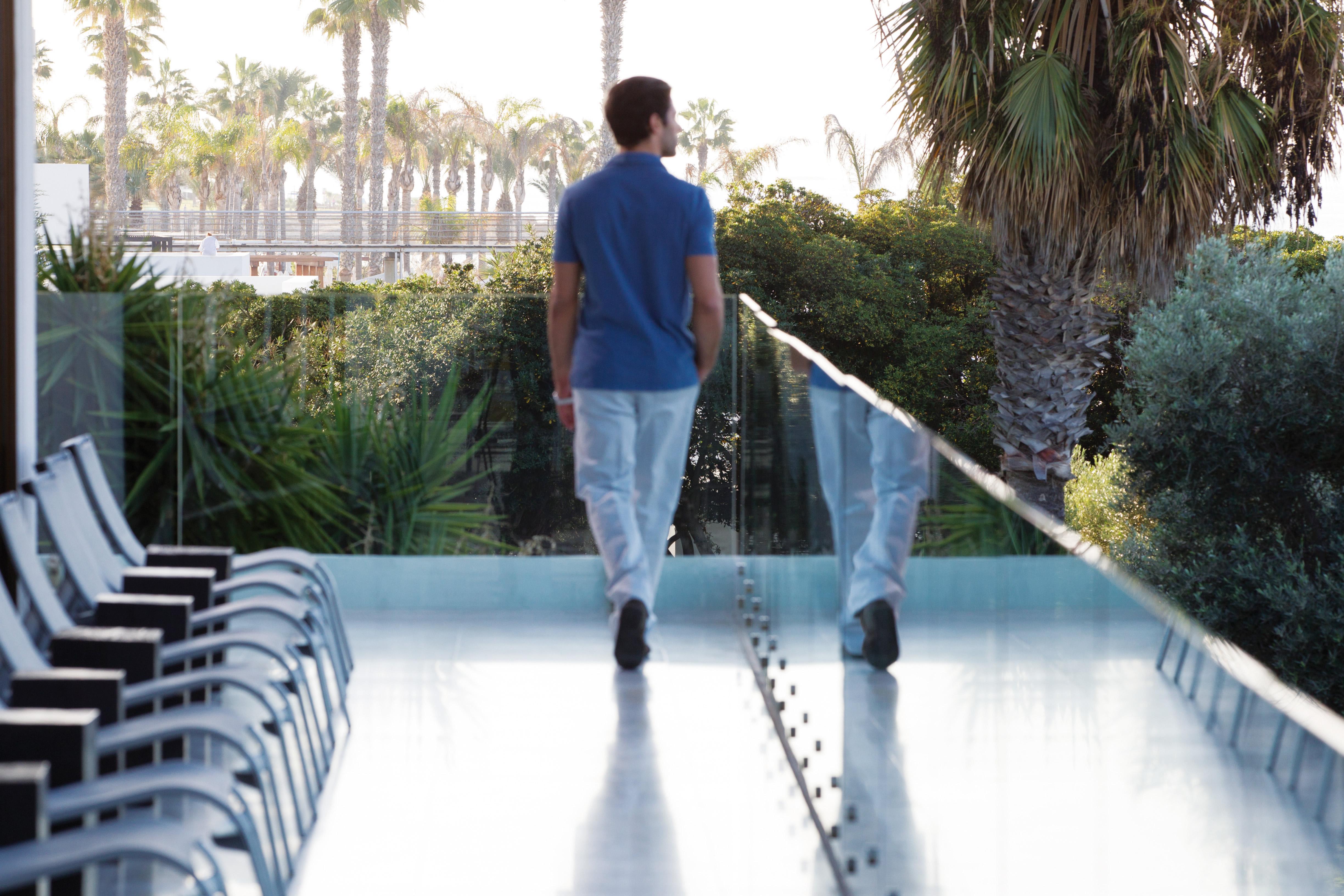 Almyra Hotel Пафос Екстериор снимка A man walking
