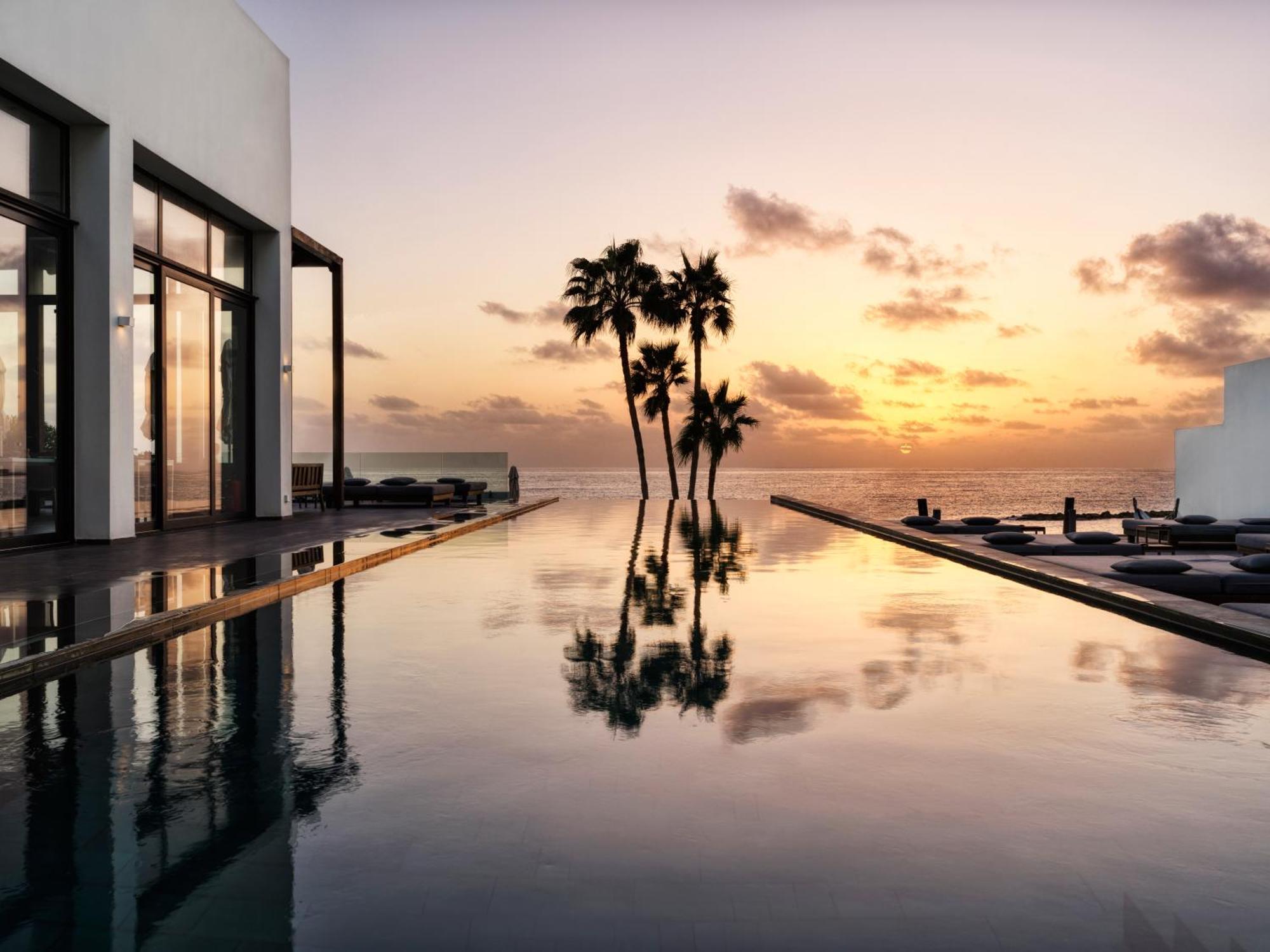 Almyra Hotel Пафос Екстериор снимка Sunset at the St Regis Maldives